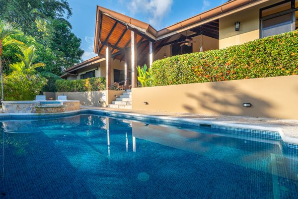Large swimming pool with smaller plunge pool for sitting and relaxing