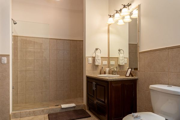 well-lit, elegant bathroom that enhances its modern design.