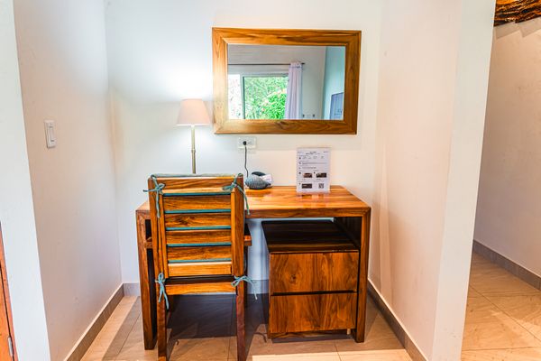 Enjoy the new wooden desk and chair at the living room.