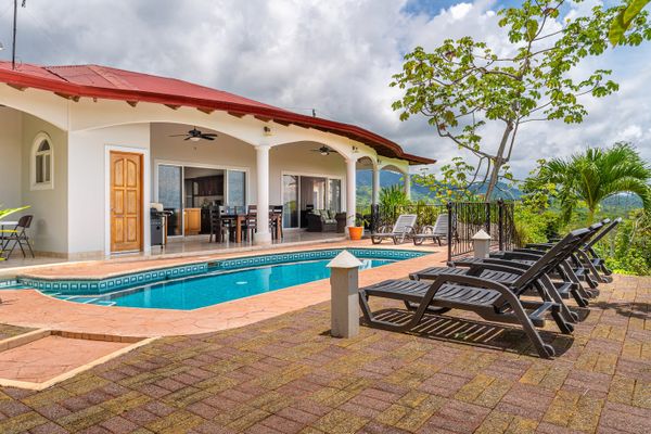 Large patio, plenty of outdoor seating, and covered patio for year-round enjoyment. Outdoor sink and grill makes it easy to enjoy the outdoors.
