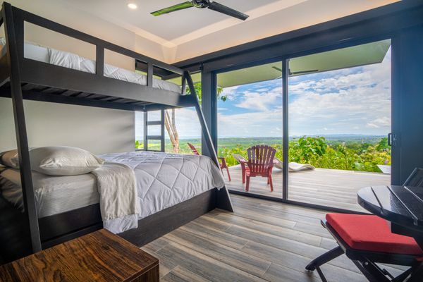 Third - in suite bedroom has a queen size lower bedroom and a single top bed