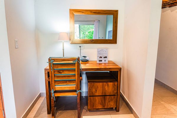 Enjoy the new wooden desk and chair at the living room.