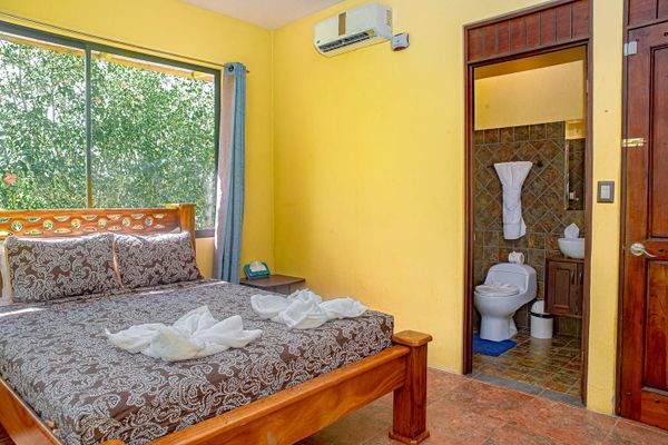 Second bedroom features its own private bathroom, offering convenience and comfort in a cozy setting