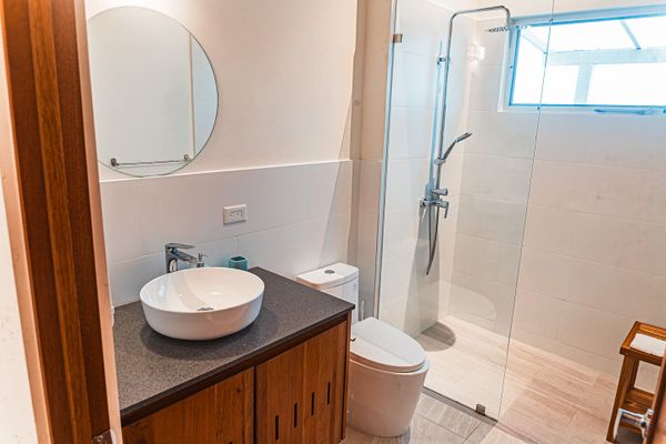 Second bathroom is conveniently located next to the hallway.