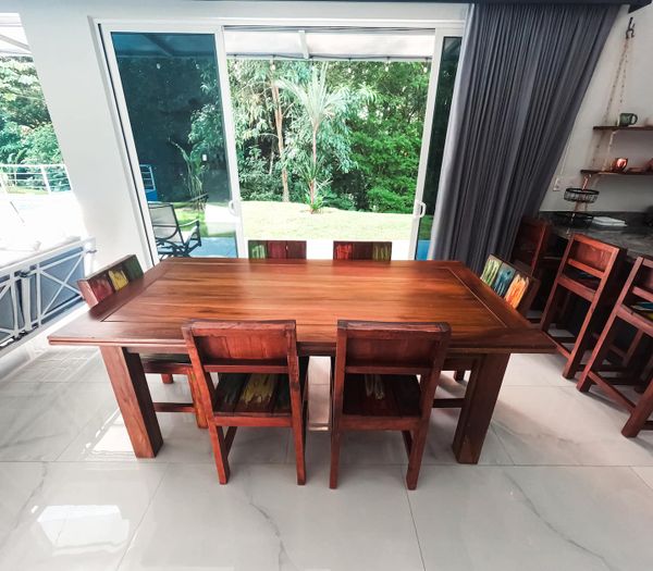 A sleek dining table, perfect for family meals or elegant dinner parties.