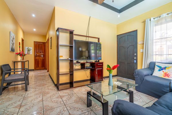 TV and A/C in the living room.