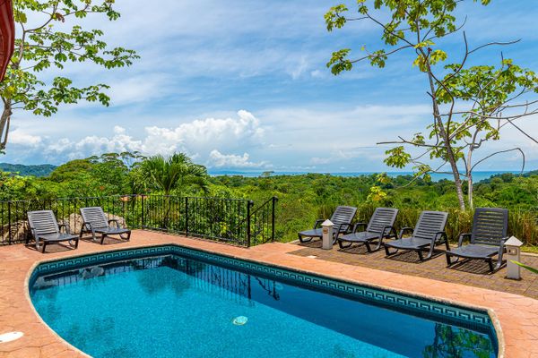 spacious pool area, perfect for swimming and relaxation.