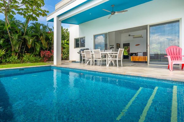 A sparkling pool, perfect for a refreshing swim or relaxing by the water.