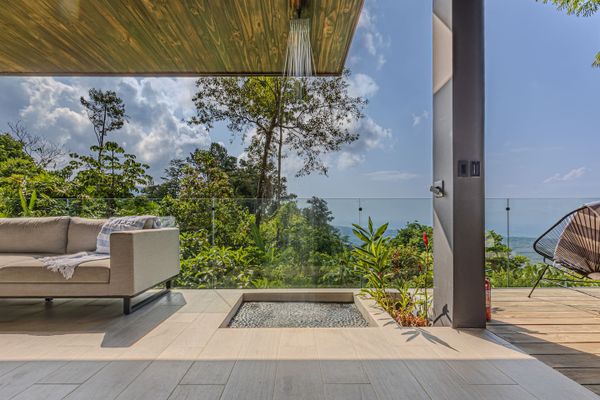 Enjoy the ocean views from the outdoor shower.