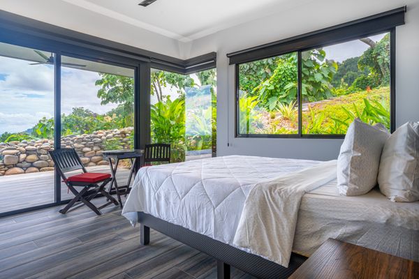 In-suite master bedroom has private access to the swimming pool and patio