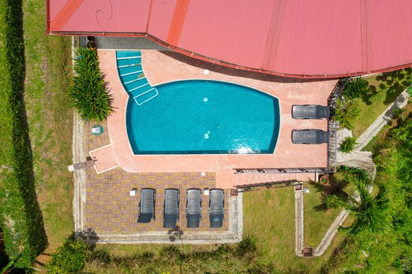 A pristine pool with crystal-clear water, offering a serene and inviting atmosphere.