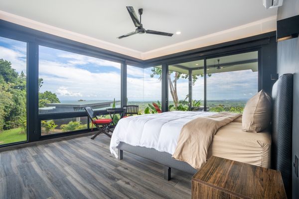 Second Bedroom has panoramic ocean views and private access to the swimming pool and patio area