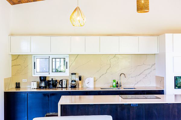 Bright kitchen with neutral tones and plenty of natural light.