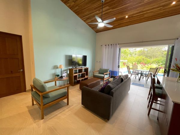 Enjoy a beautiful moment in family at the living room with a 50-inch SmartTV.