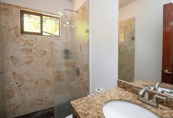stylish bathroom featuring creative touches and bold, unconventional decor.