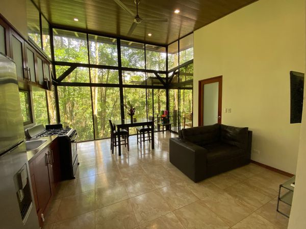 Floor to ceiling windows overlooking the Costa Rica jungle near Uvita in the Casita