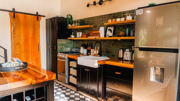 A refined kitchen with a blend of classic design and modern functionality.