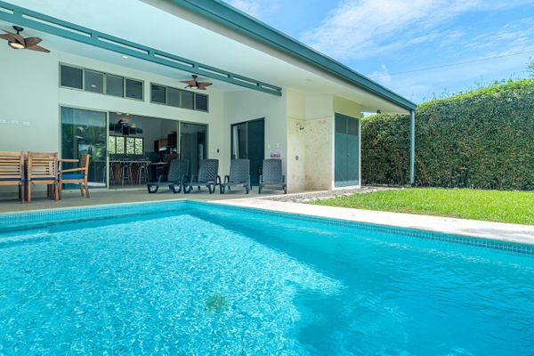 Private pool. Three bedrooms. Walk to the beach.