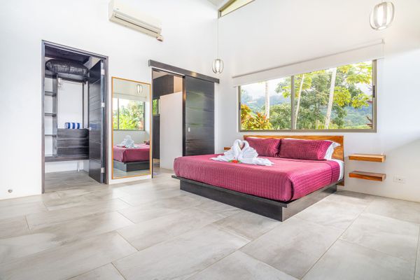Suite #1 has ocean views, mountain views, access to the private pool, along with en-suite bathroom, air conditioning and ceiling fan.