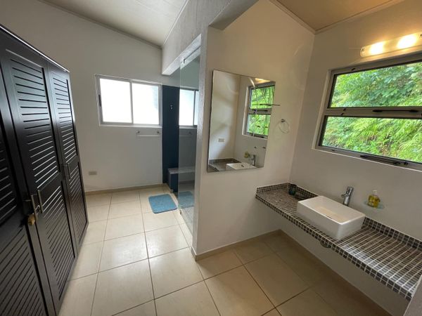 Owner's Suite has king-size bed, en suite bathroom, private balcony.