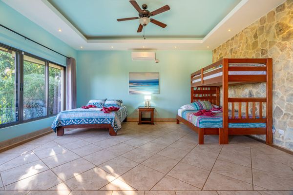 Third bedroom has 2 queen side beds and a single bed in bunk