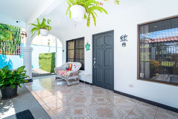 Enjoy the breezes year-round from the covered front porch.