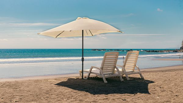 A relaxing beach right in front of your room, with the gentle sounds of the sea and a Pacific breeze.