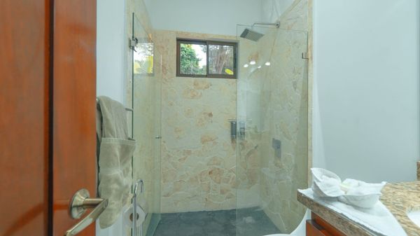 The casita has a beautiful bathroom, designed for both comfort and style.