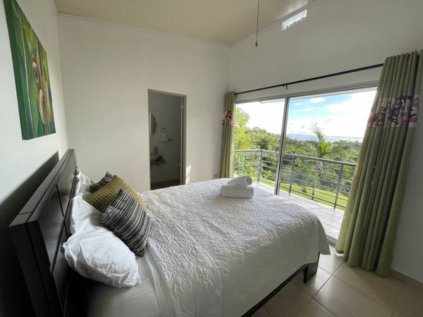Third in- suite  bedroom is in the second floor and has a private ocean view balcony