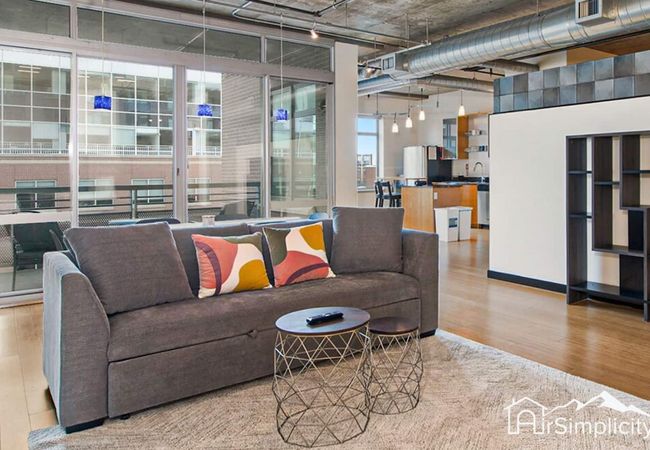 Union station loft • covered parking • gym • patio