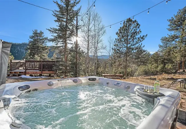 Luxury home with hot tub and mountain views