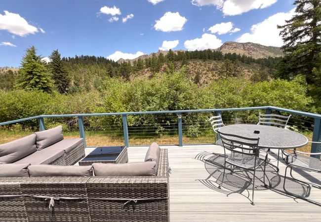 Scenic cabin on river w/ deck & mountain views