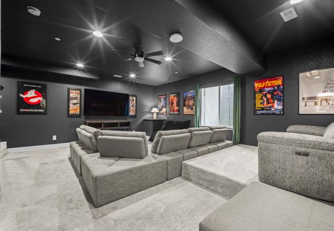 Modern home with firepit, grill, and cinema room