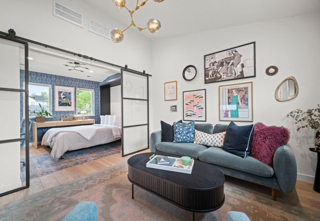Modern studio with workspace and kitchenette