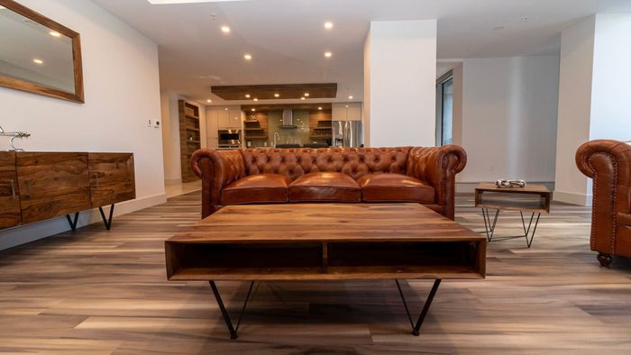 Unwind in Elegance – Spacious Living Area with Stunning Cityscape Views.