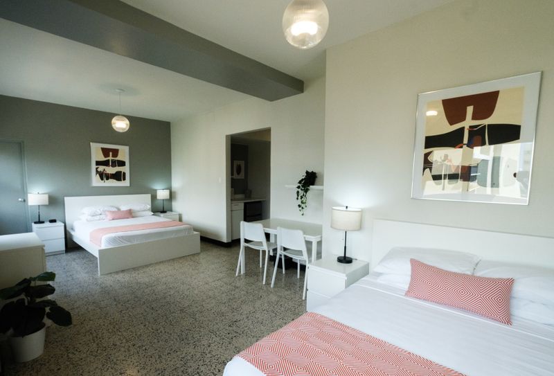 This well-arranged studio combines comfort with functionality, featuring a cozy bed and a convenient desk area, perfect for both leisure and work.