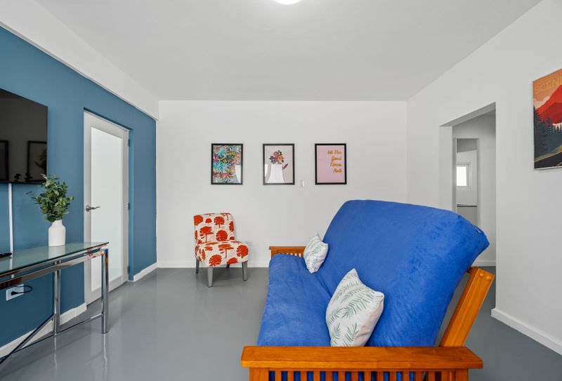 Escape to a haven of contemporary comfort where vibrant colors meet elegant design for an unforgettable stay.