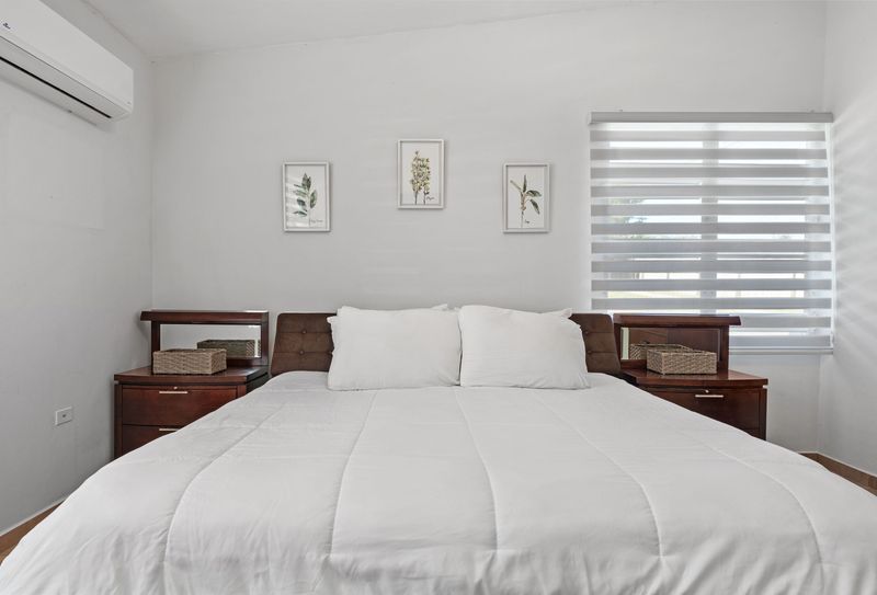 Peaceful slumber: Your comfortable and serene private bedroom.