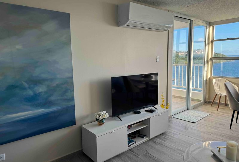 Relax in Style: Unwind in this chic and comfortable living space, perfect for movie nights or quiet evenings after exploring.