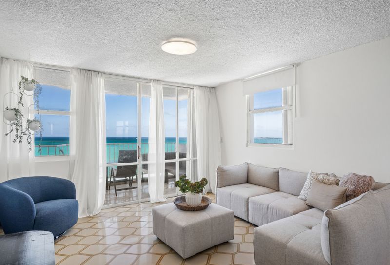 Beachfront Rental | Isla Verde 4 Your ultimate gathering spot! With abundant natural light and stunning ocean vistas, this living room is perfect for entertaining or simply unwinding with loved ones.