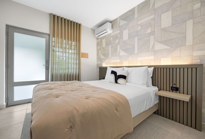 Wake up to natural light in this bright and airy bedroom.