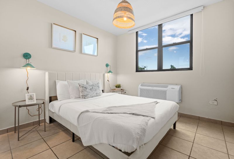 Create your own personal oasis in this inviting bedroom, perfect for relaxing and unwinding after a day of adventure.