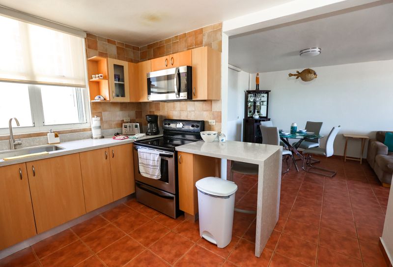 A stylish and functional kitchen with high-end appliances and modern finishes create a sophisticated and contemporary look.
