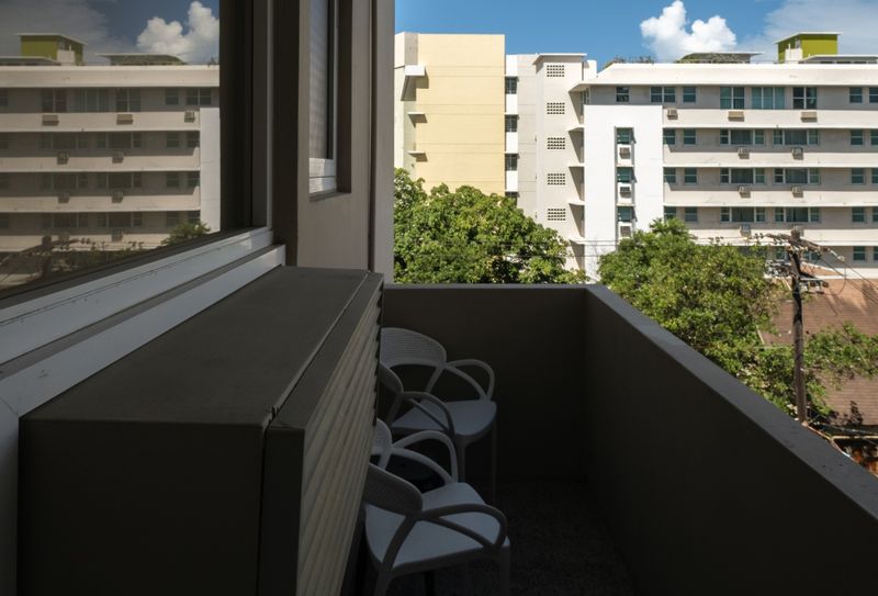 Sip your favorite beverage while taking in the charming views from your personal balcony. It's a wonderful extension of your living space, offering a touch of outdoor tranquility.