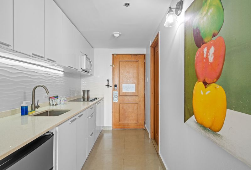 Enjoy the convenience of home-cooked meals with all the essential kitchenware provided for your culinary adventures.