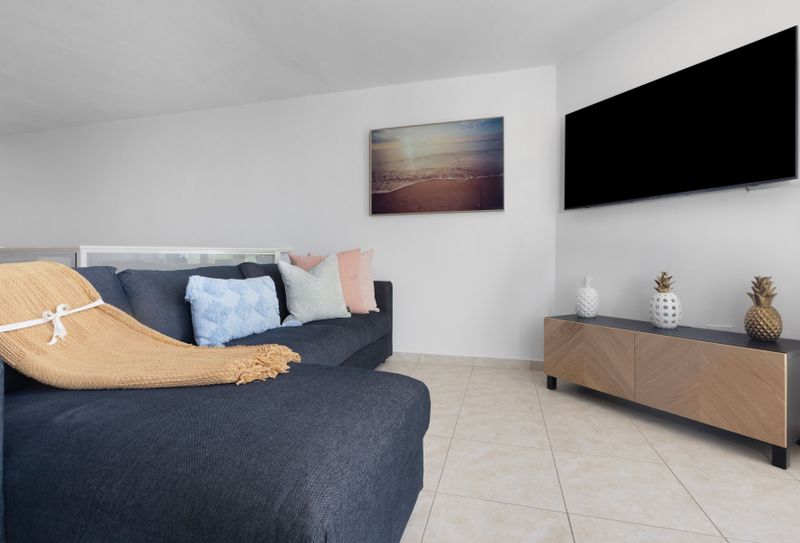Spacious open-concept living room designed with seamless flow.