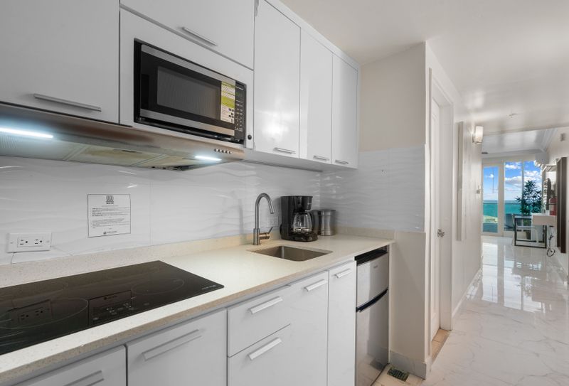 "Whip up your favorite breakfast or a quick lunch in this bright and functional kitchenette