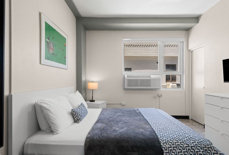 Feel at home in this serene room with essential amenities.