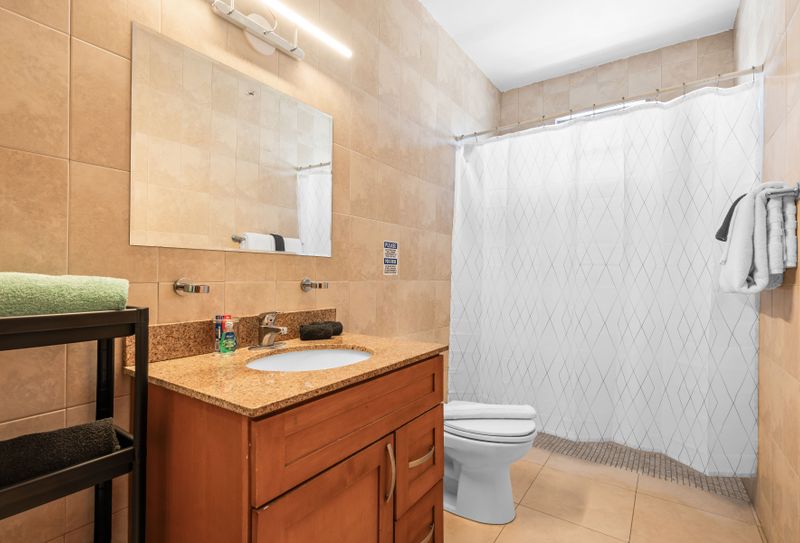 Sparkling Clean Modern Bathroom. Fresh Towels.