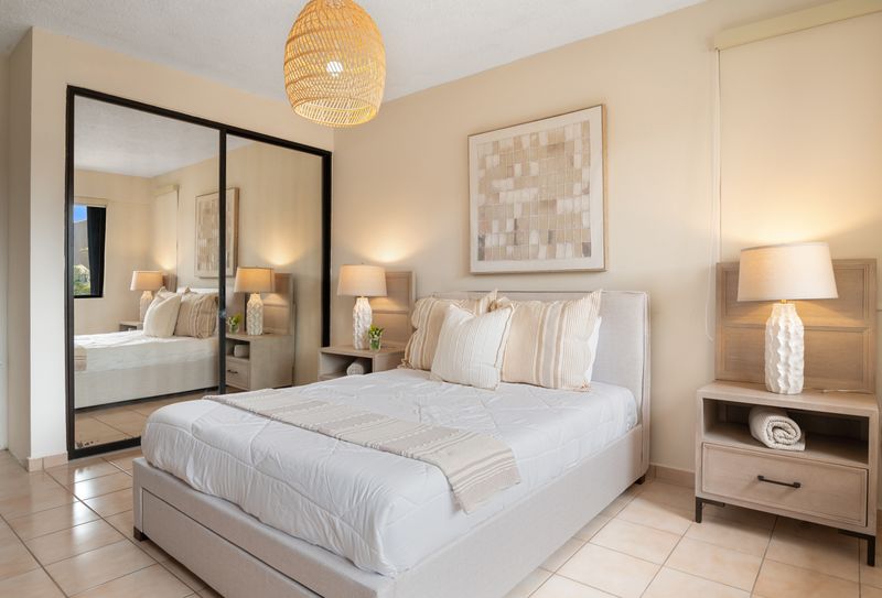 Step into comfort and style! This bedroom is a tranquil haven with a comfortable bed and practical amenities.